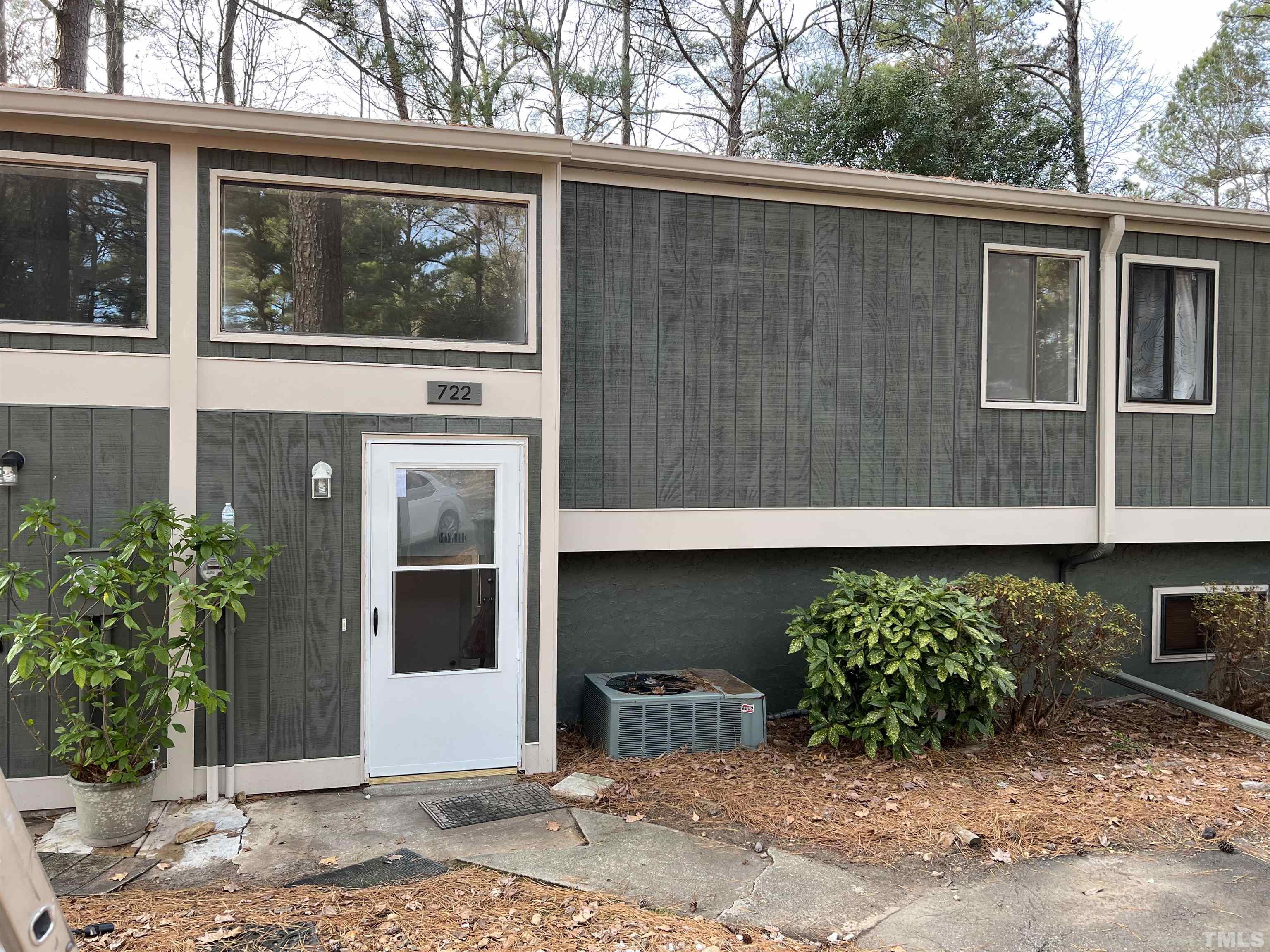722 Godwin Court Raleigh, NC 27606 - Photo 3 of 41 a front view of a house with a yard
