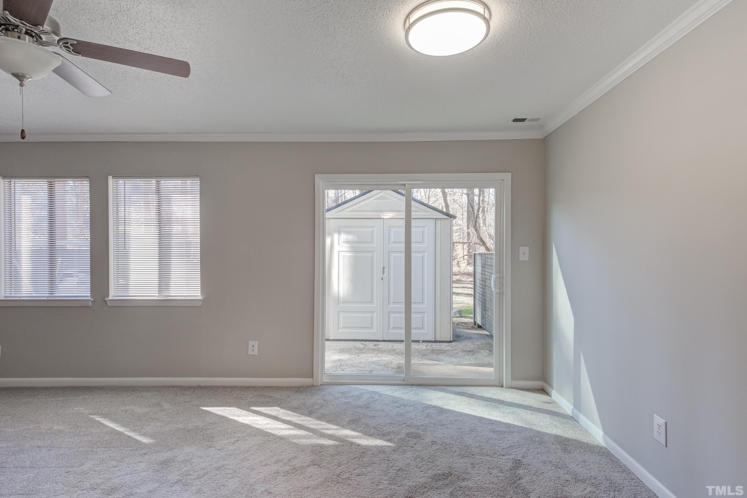 722 Godwin Court Raleigh, NC 27606 - Photo 24 of 41 an empty room with windows
