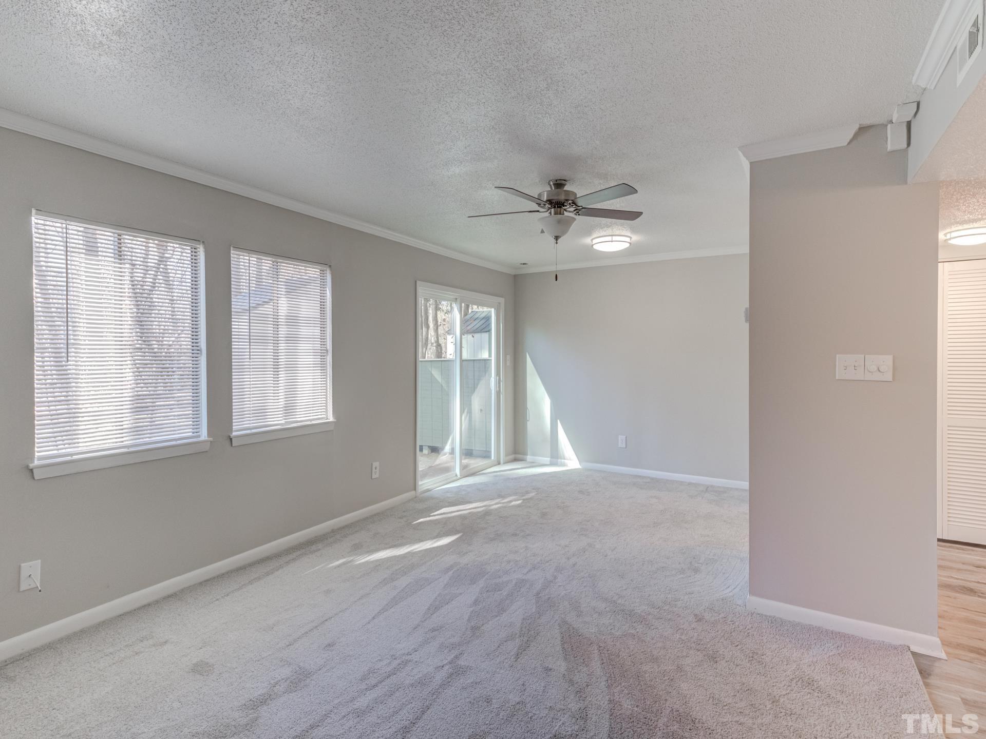 722 Godwin Court Raleigh, NC 27606 - Photo 8 of 41 a view of an empty room with a window