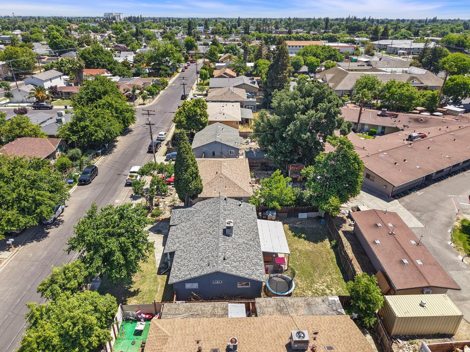 152 Drake Avenue Modesto, CA 95350 - Photo 35 of 52 an aerial view of residential houses with outdoor space