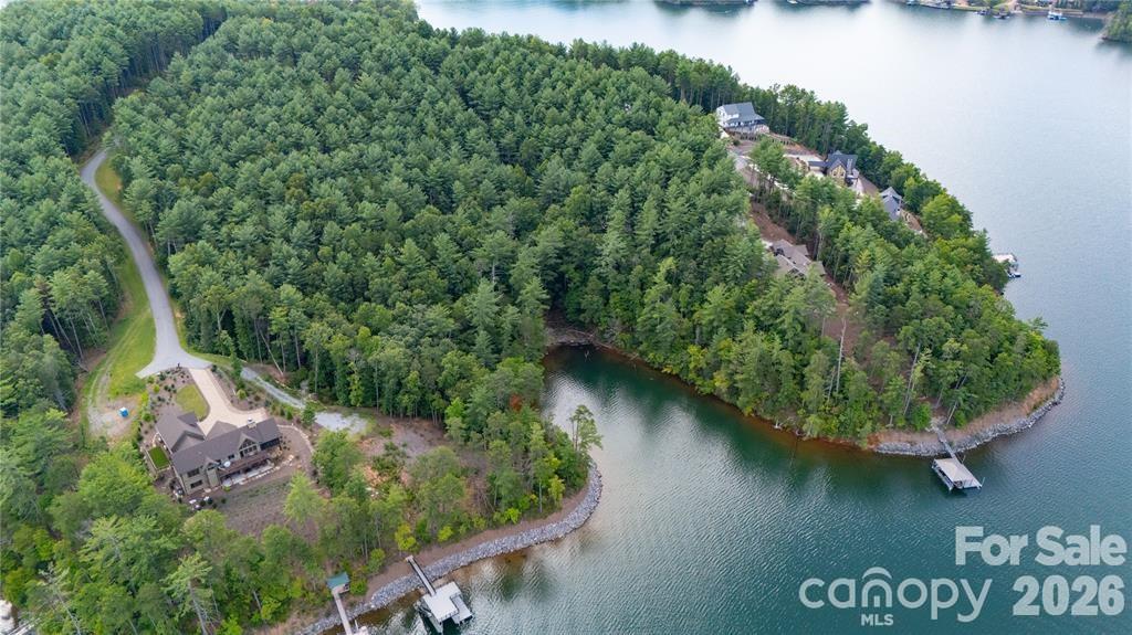 154 West Point Drive Nebo, NC 28761 - Photo 12 of 21 an aerial view of a house with outdoor space and lake view