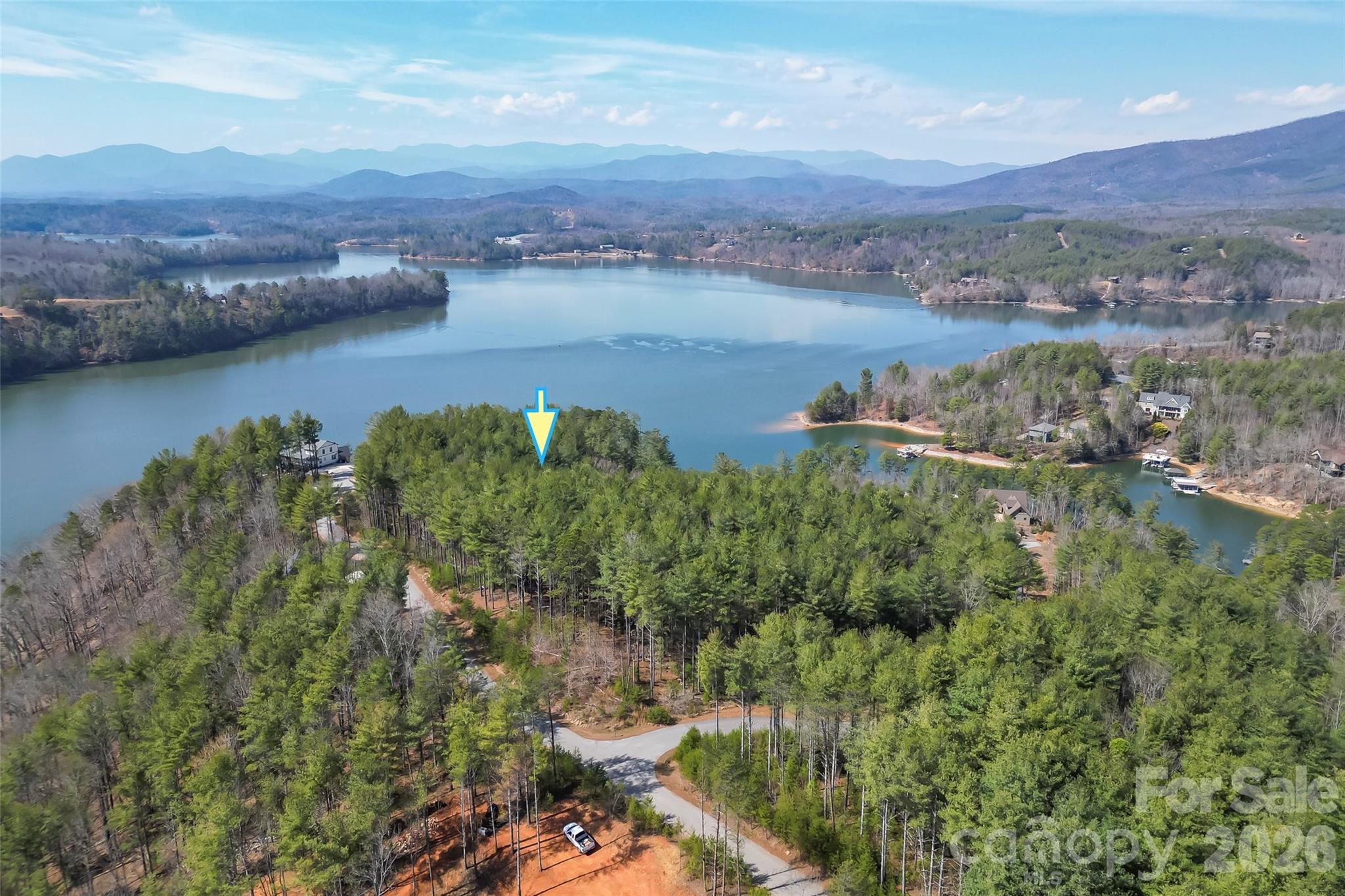 154 West Point Drive Nebo, NC 28761 - Photo 4 of 21 an aerial view of houses covered in trees
