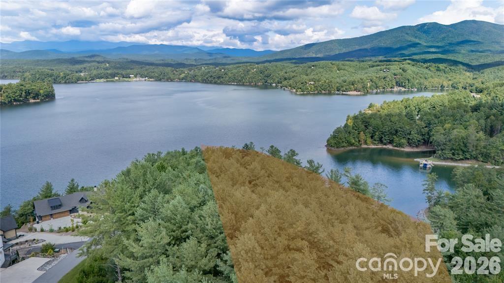 154 West Point Drive Nebo, NC 28761 - Photo 10 of 21 a view of a lake with a mountain in the background