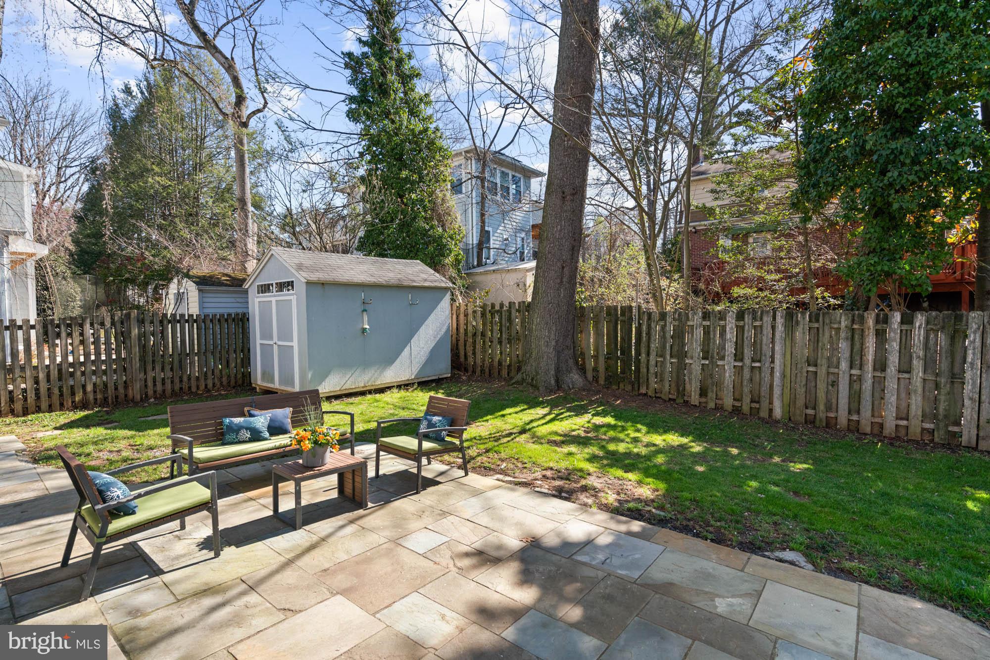 5305 Wakefield Road Bethesda, MD 20816 - Photo 86 of 87 a view of a chairs and table in backyard of the house