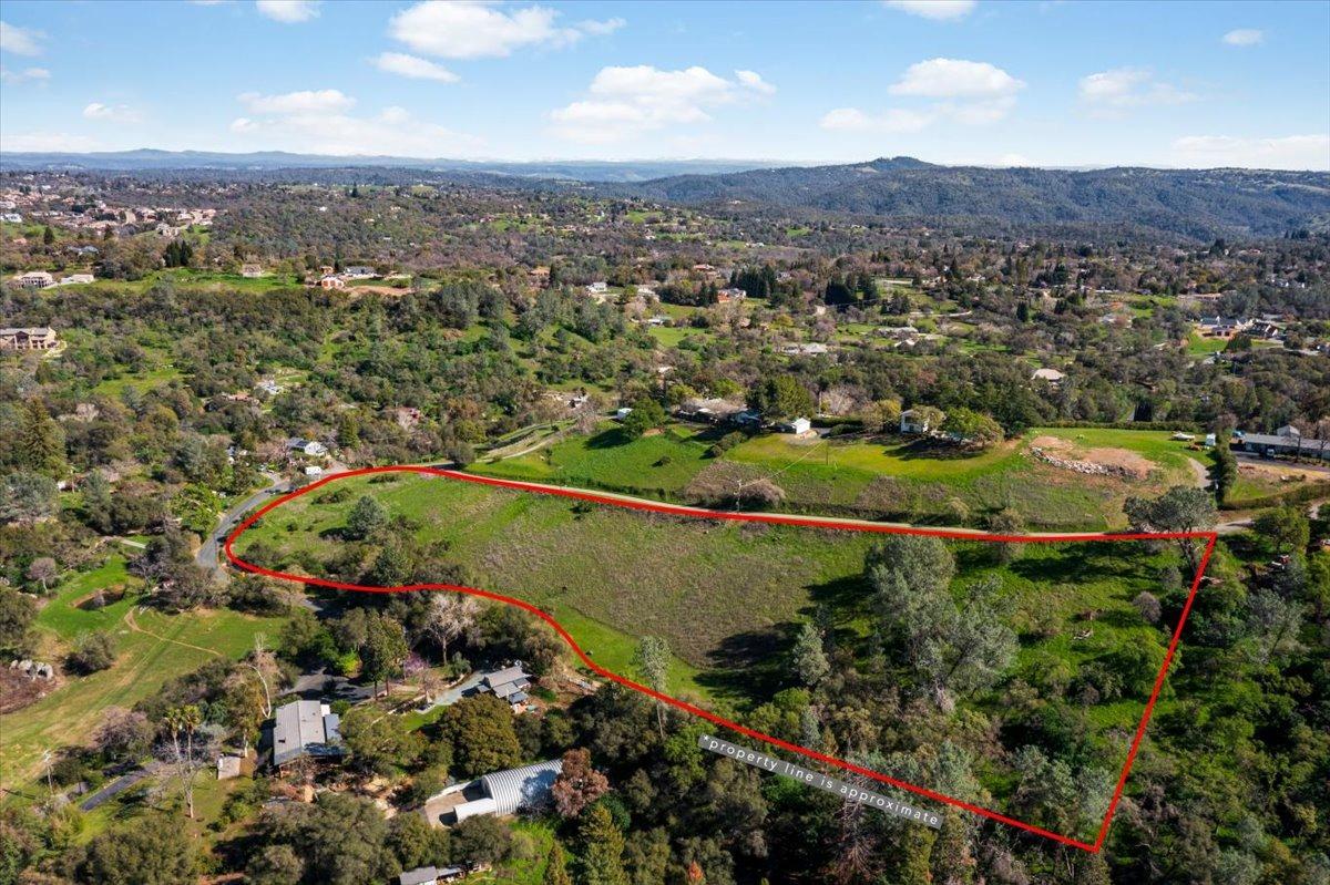 5 Oak Terrace Newcastle, CA 95658 - Photo 7 of 20 an aerial view of a houses with a yard and lake view
