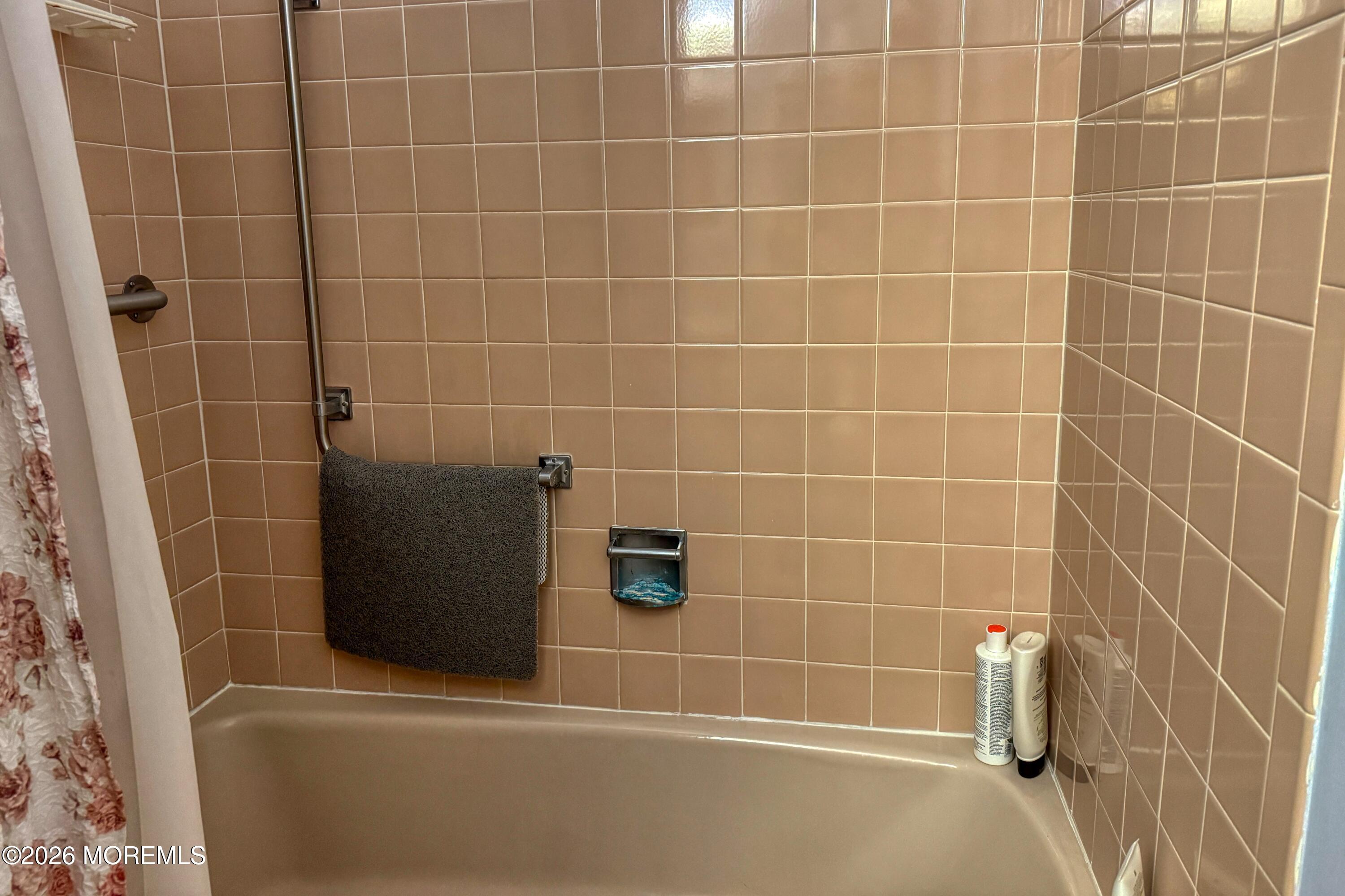 8 Lexington Drive, Unit B Whiting, NJ 08759 - Photo 8 of 11 a bathroom with a shower