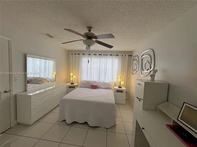 a close view of a dresser and a mirror