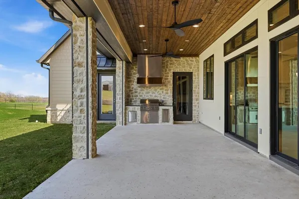 a view of an entryway with a garden