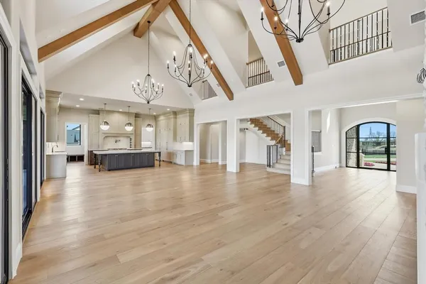a view of an entryway with wooden floor