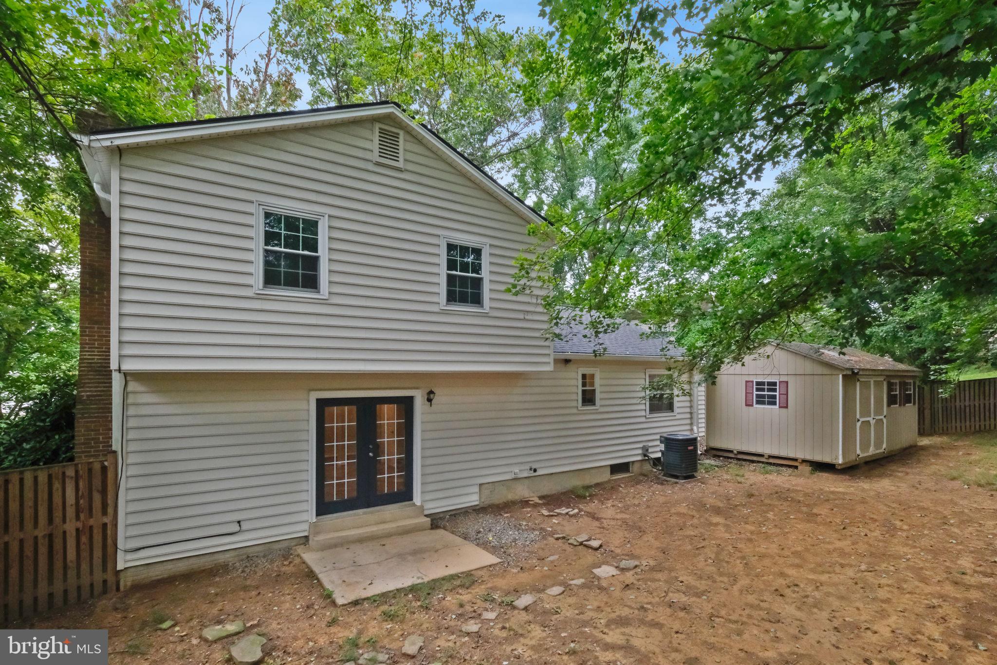 5 Winesap Court Gaithersburg, MD 20878 - Photo 37 of 44 a view of a house with a backyard