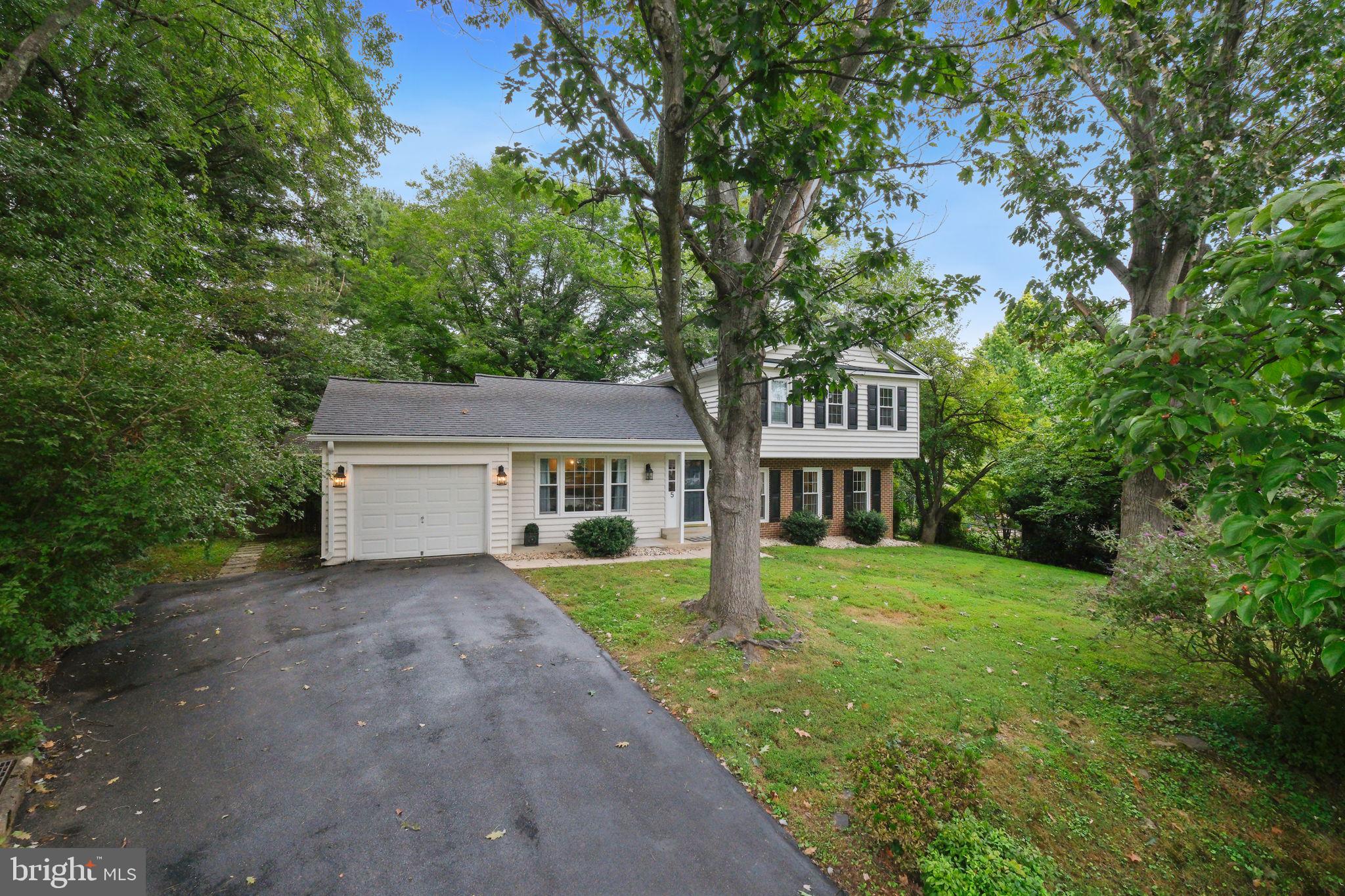 5 Winesap Court Gaithersburg, MD 20878 - Photo 5 of 44 front view of a house with a yard