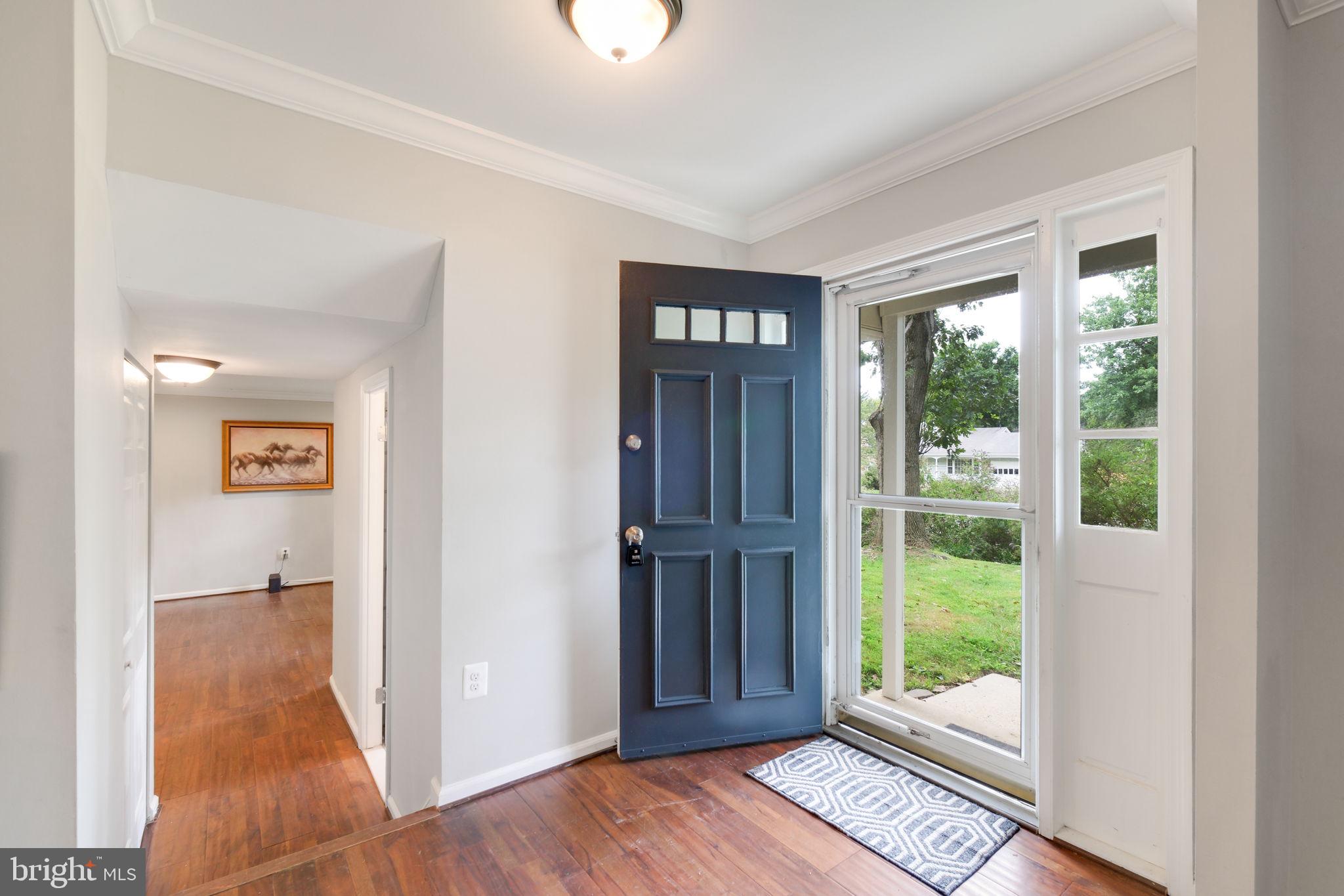 5 Winesap Court Gaithersburg, MD 20878 - Photo 6 of 44 a view of a room with wooden floor and windows