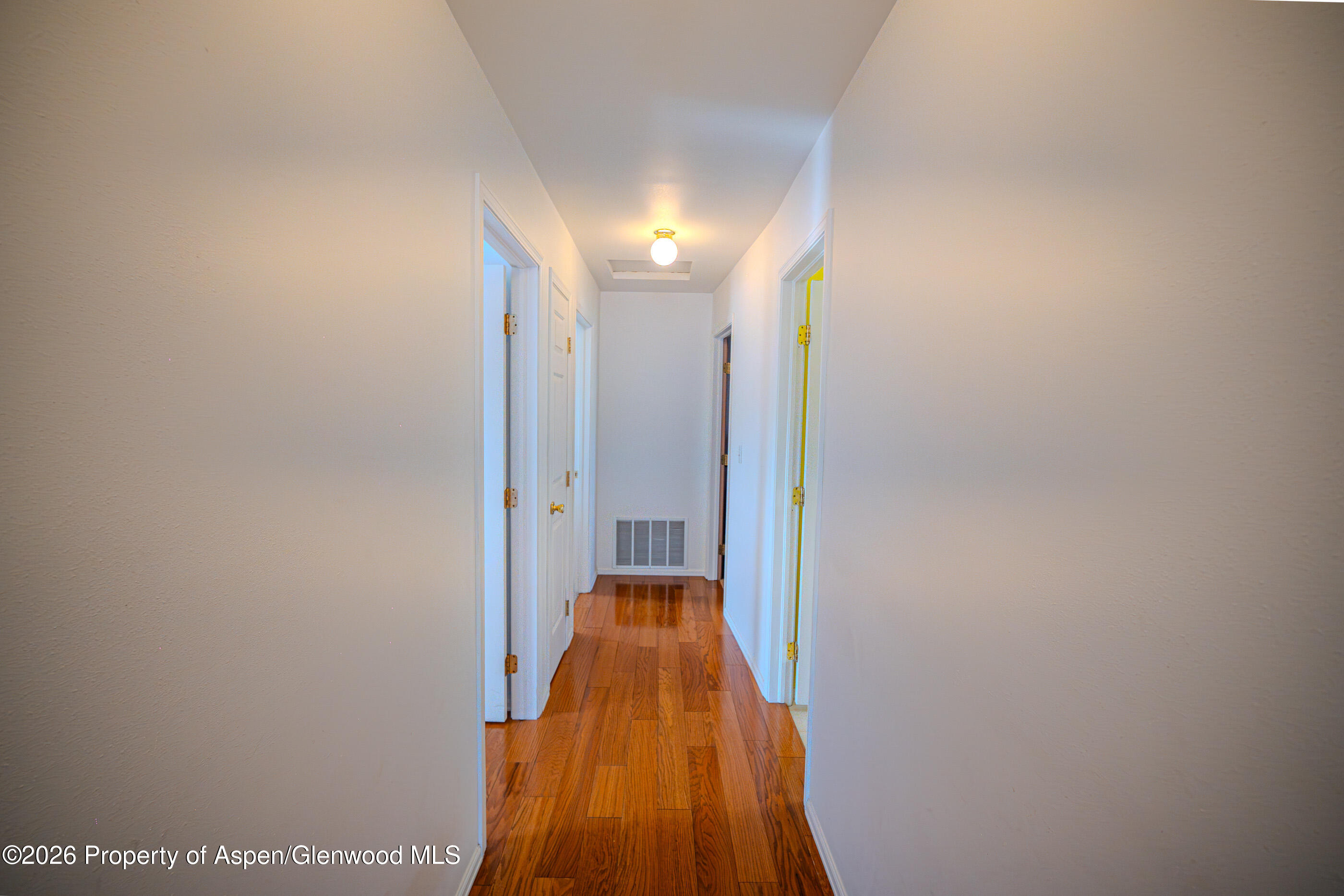2319 Meadow Circle Rifle, CO 81650 - Photo 15 of 33 a view of hallway with stairs