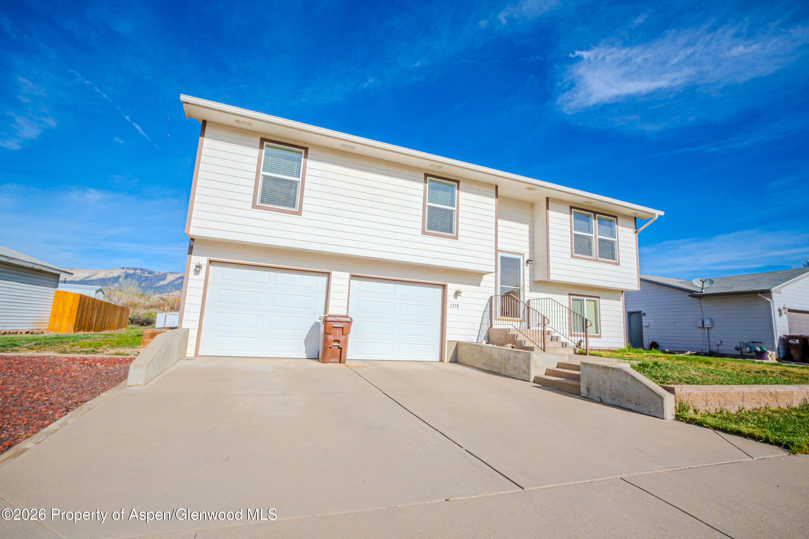 2319 Meadow Circle Rifle, CO 81650 - Photo 23 of 33 a view of a house with a patio