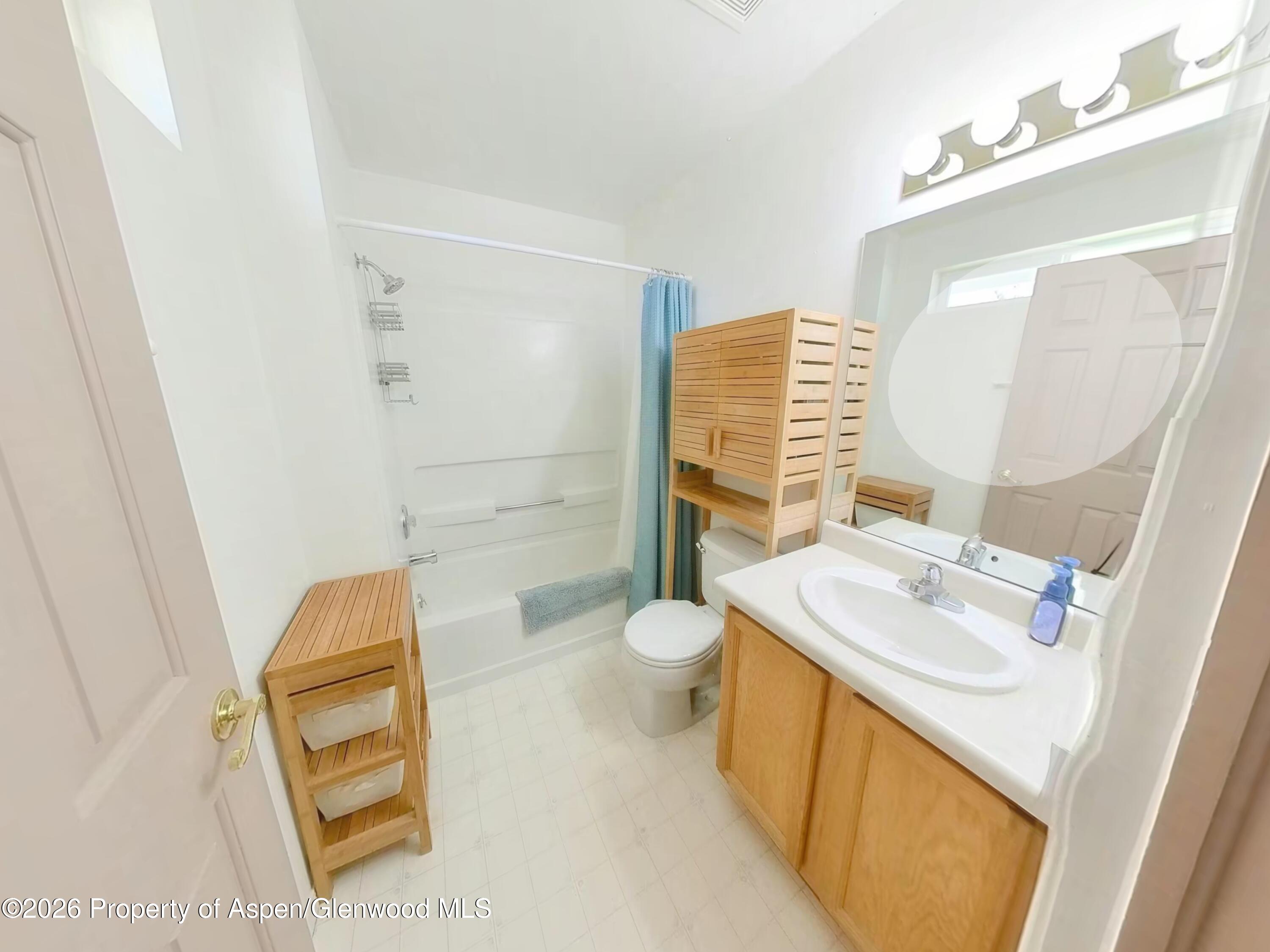 2319 Meadow Circle Rifle, CO 81650 - Photo 28 of 33 a bathroom with a sink toilet and shower