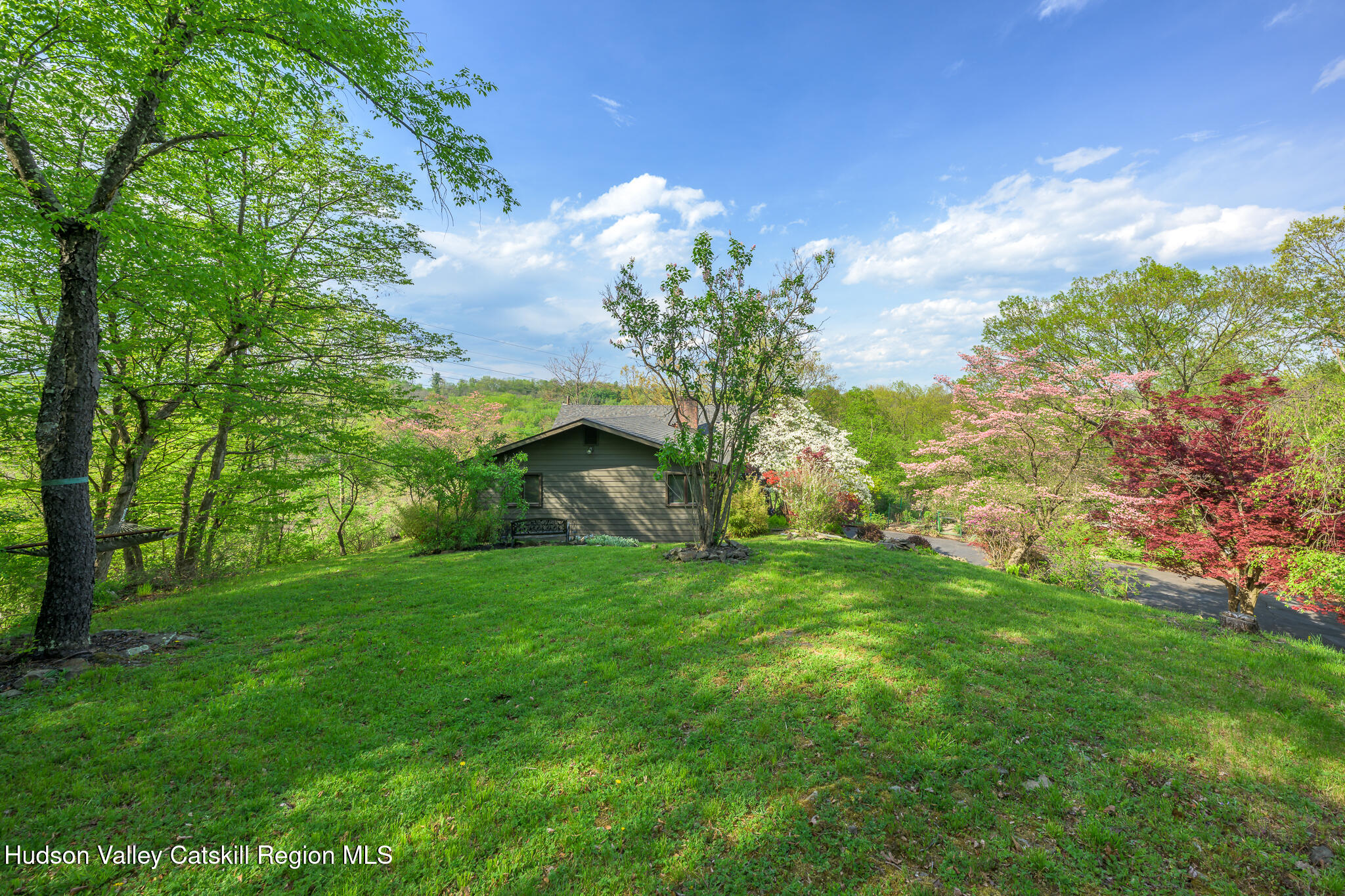 29 Edgemere Hill Road Catskill, NY 12414 - Photo 27 of 38 a backyard of a house with lots of green space