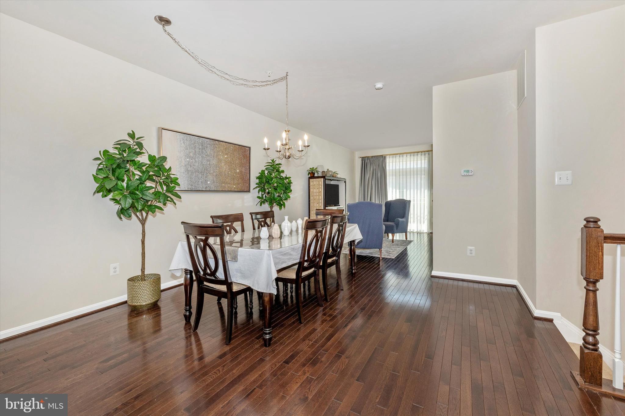 4731 Verdana Loop Frederick, MD 21703 - Photo 11 of 51 a view of a dining room with furniture and wooden floor