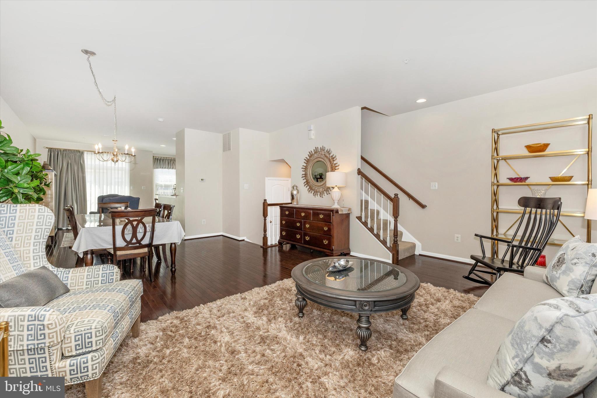 4731 Verdana Loop Frederick, MD 21703 - Photo 14 of 51 a living room with furniture and a table