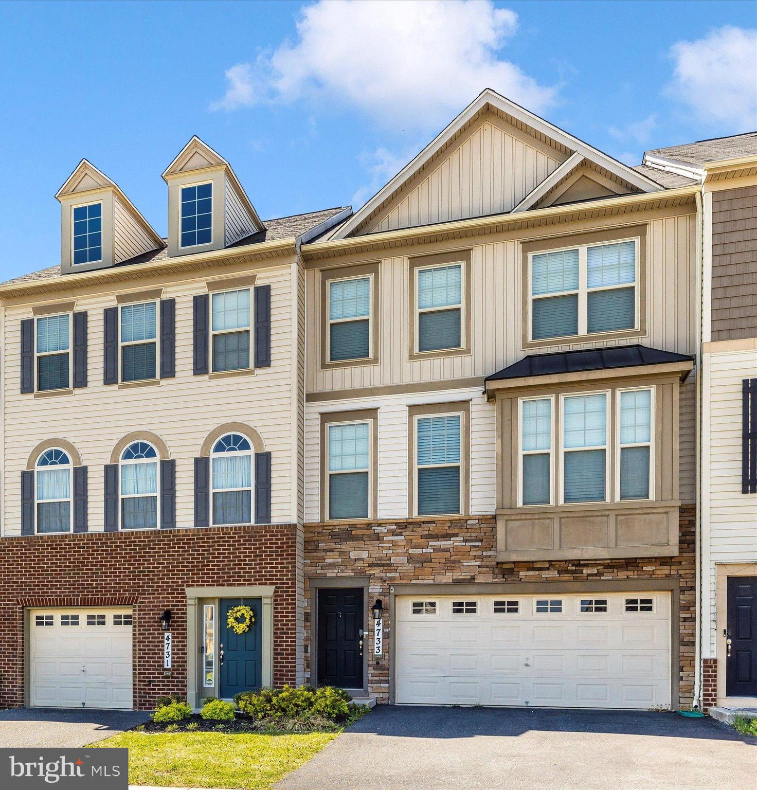 4731 Verdana Loop Frederick, MD 21703 - Photo 2 of 51 a front view of multiple houses