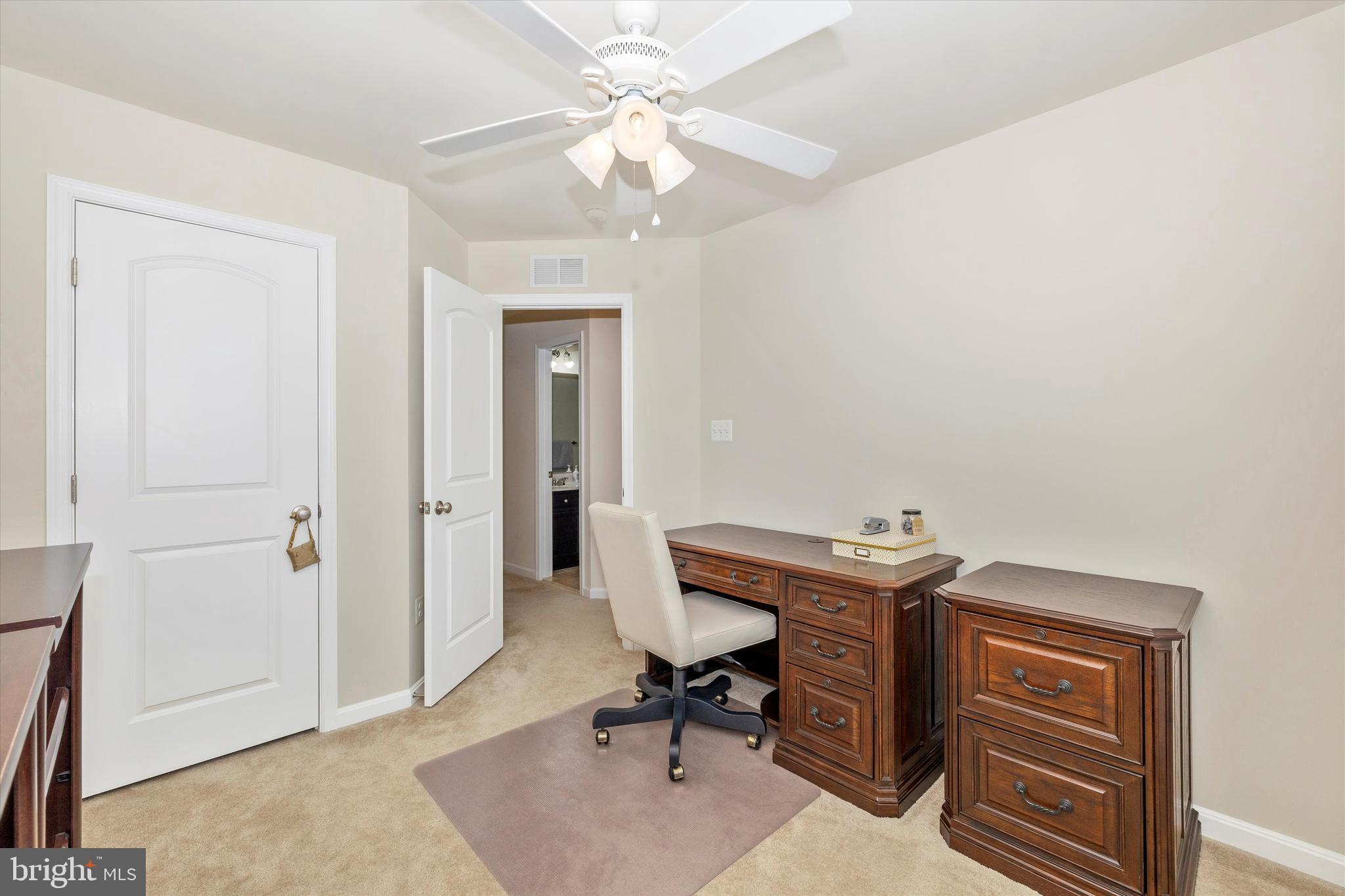 4731 Verdana Loop Frederick, MD 21703 - Photo 31 of 51 a view of a workspace with furniture and a window