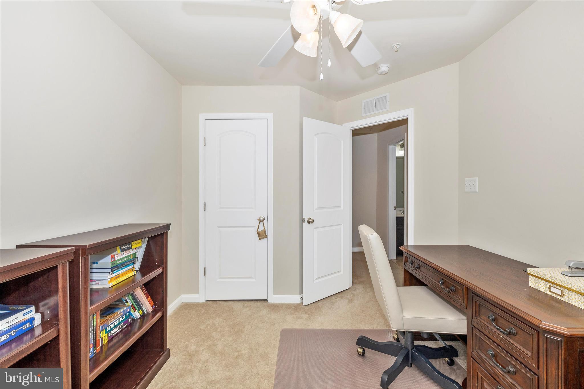 4731 Verdana Loop Frederick, MD 21703 - Photo 32 of 51 a view of a livingroom with furniture and a chandelier