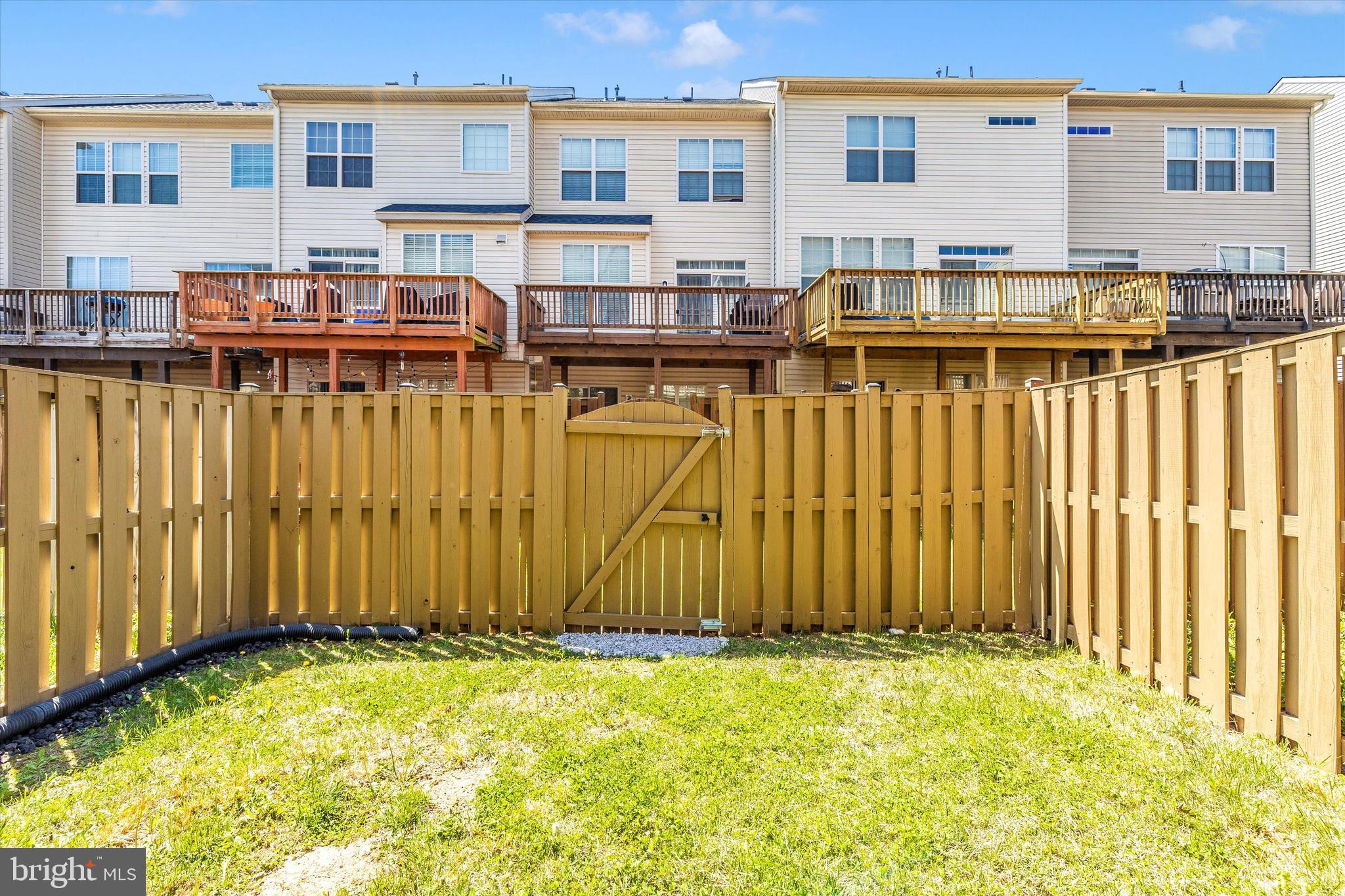 4731 Verdana Loop Frederick, MD 21703 - Photo 40 of 51 a front view of a house with a garden