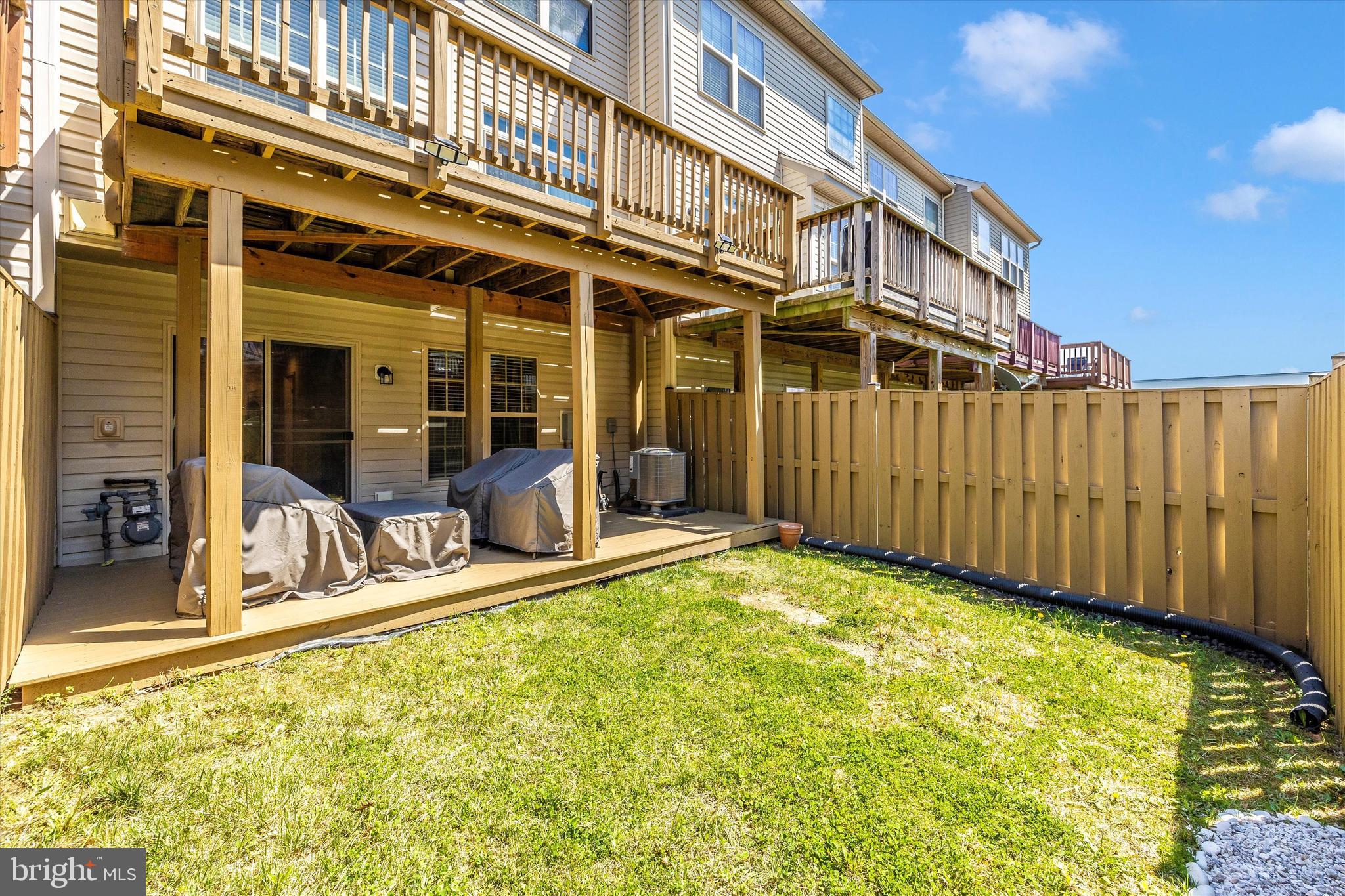 4731 Verdana Loop Frederick, MD 21703 - Photo 41 of 51 a view of a building with a backyard
