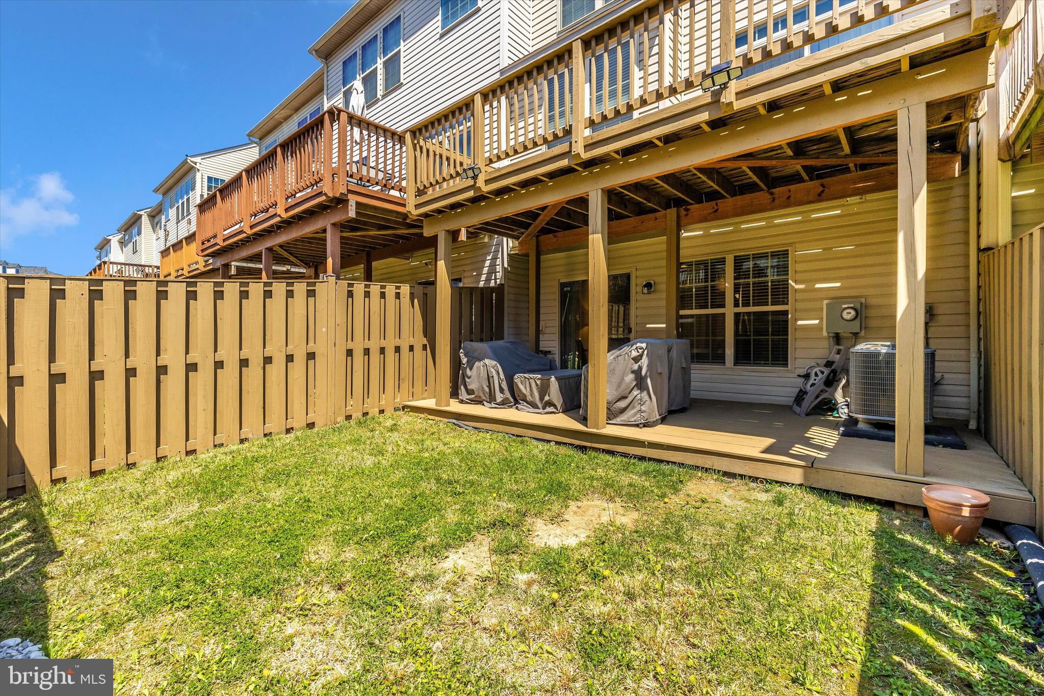 4731 Verdana Loop Frederick, MD 21703 - Photo 44 of 51 front view of a building with a yard