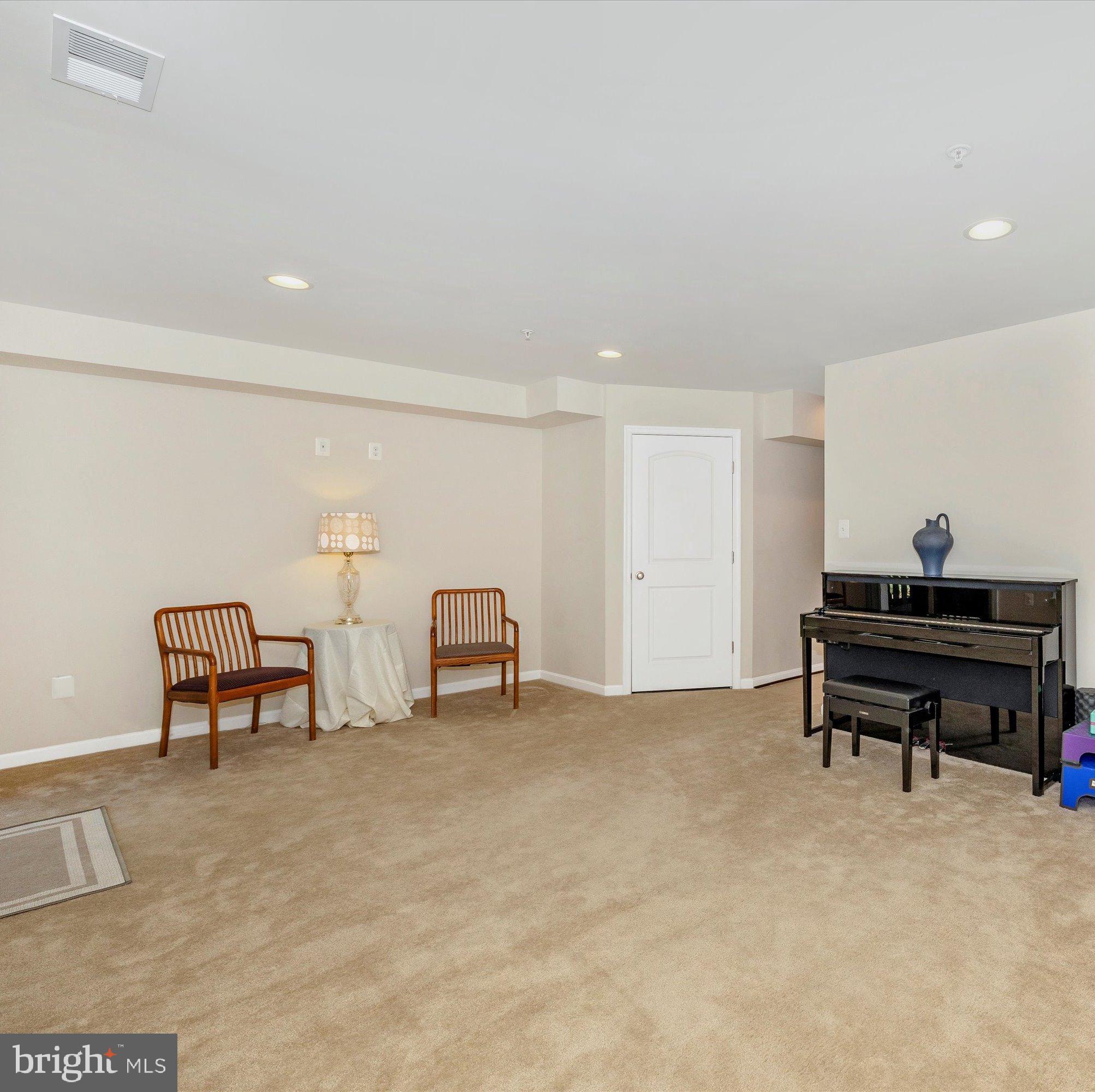 4731 Verdana Loop Frederick, MD 21703 - Photo 7 of 51 a view of a livingroom with furniture