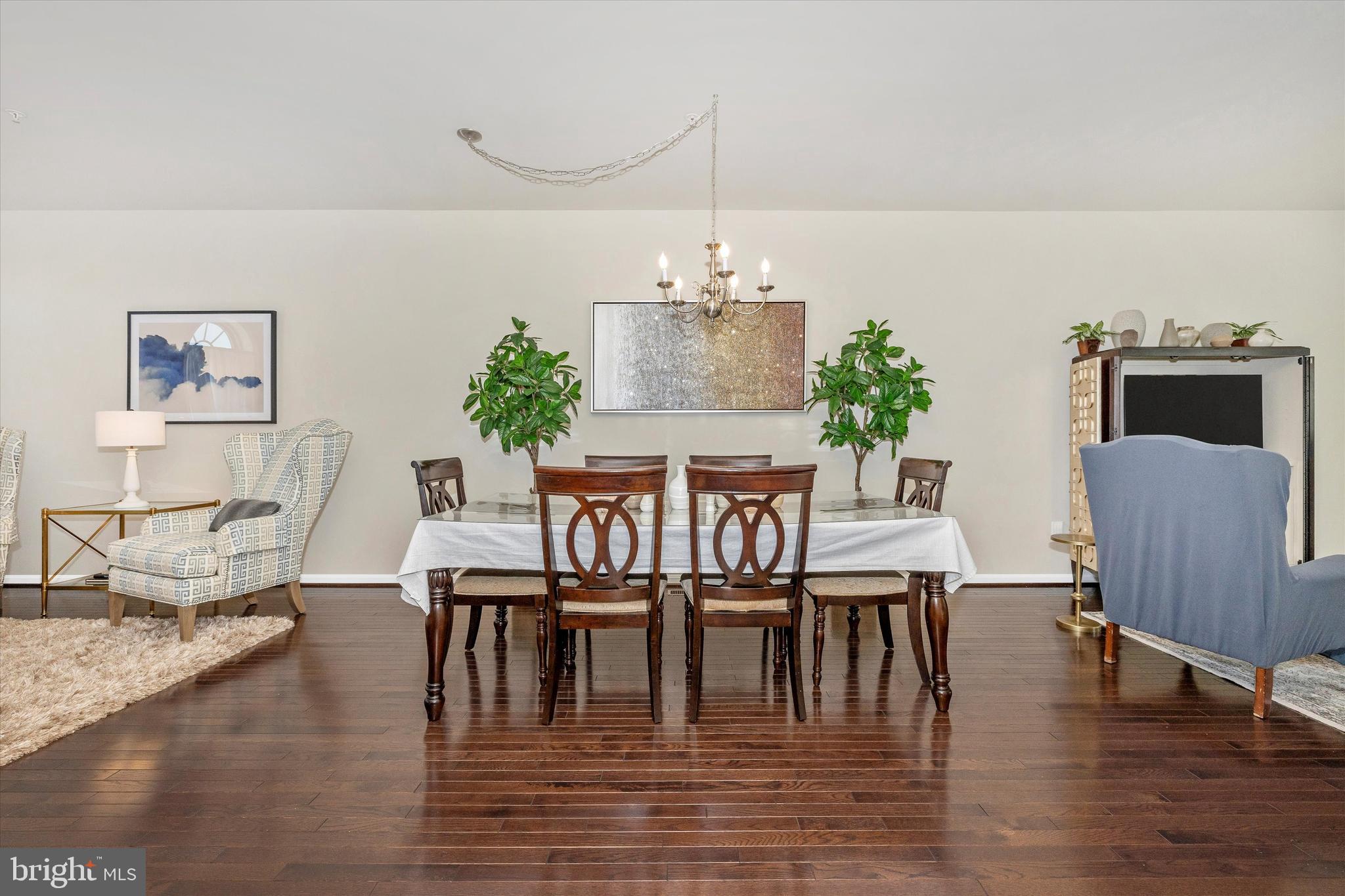 4731 Verdana Loop Frederick, MD 21703 - Photo 10 of 51 a view of a dining room with furniture and wooden floor