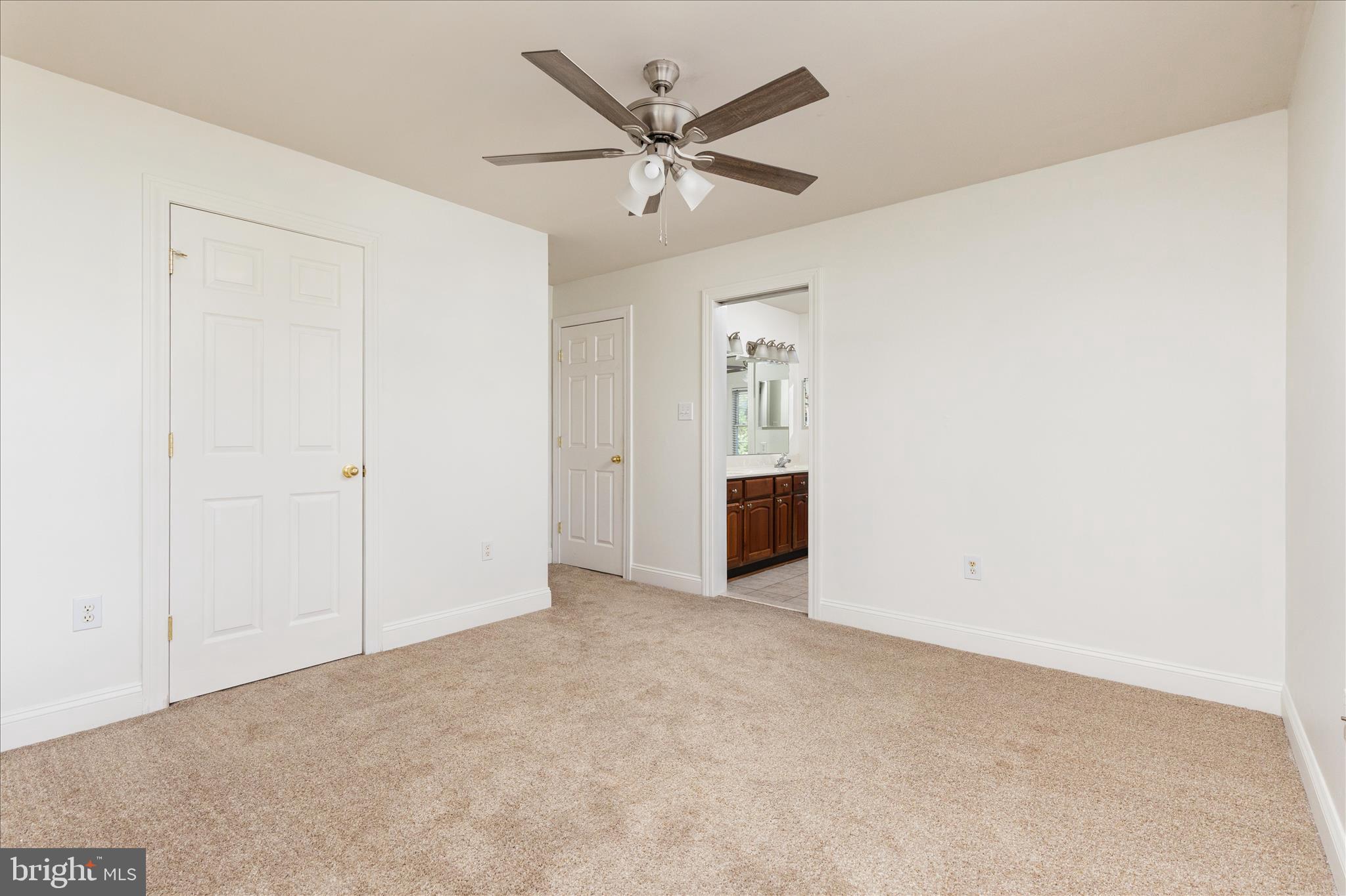 1200 Salem Church Road Stephens City, VA 22655 - Photo 25 of 69 an empty room with closet and ceiling fan