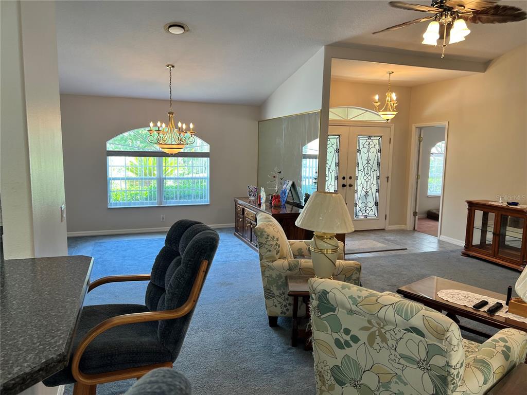 1995 East Newhaven Street Inverness, FL 34453 - Photo 9 of 48 a view of a livingroom with furniture and window