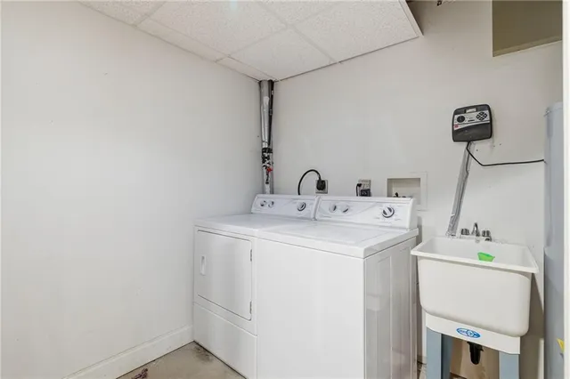 a utility room with dryer and washer