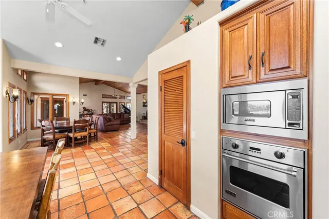 a bathroom with a bathtub sink and mirror