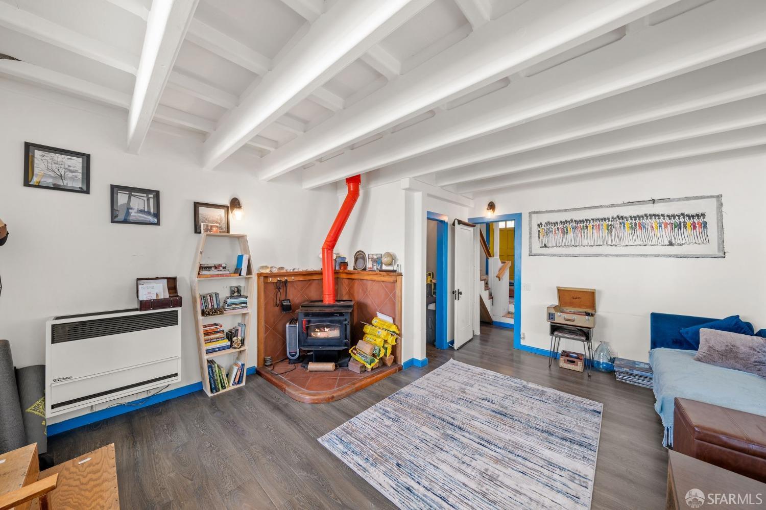 1900 Stenmark Drive, Unit 3302 Richmond, CA 94801 - Photo 6 of 10 a living room with furniture and a flat screen tv