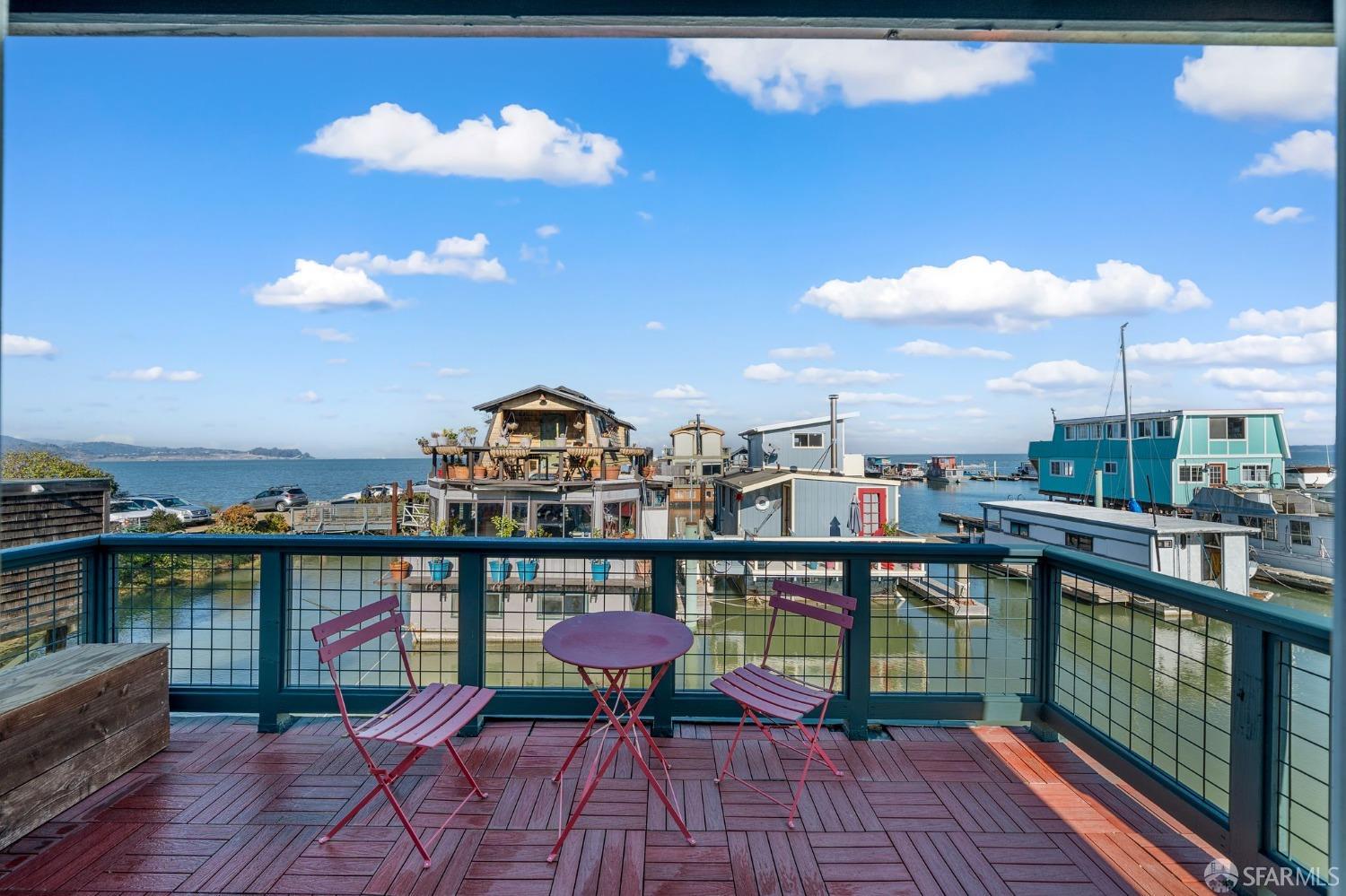 1900 Stenmark Drive, Unit 3302 Richmond, CA 94801 - Photo 9 of 10 a view of a balcony with chairs
