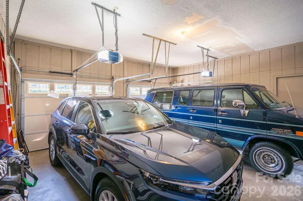 a view of roof deck with furniture