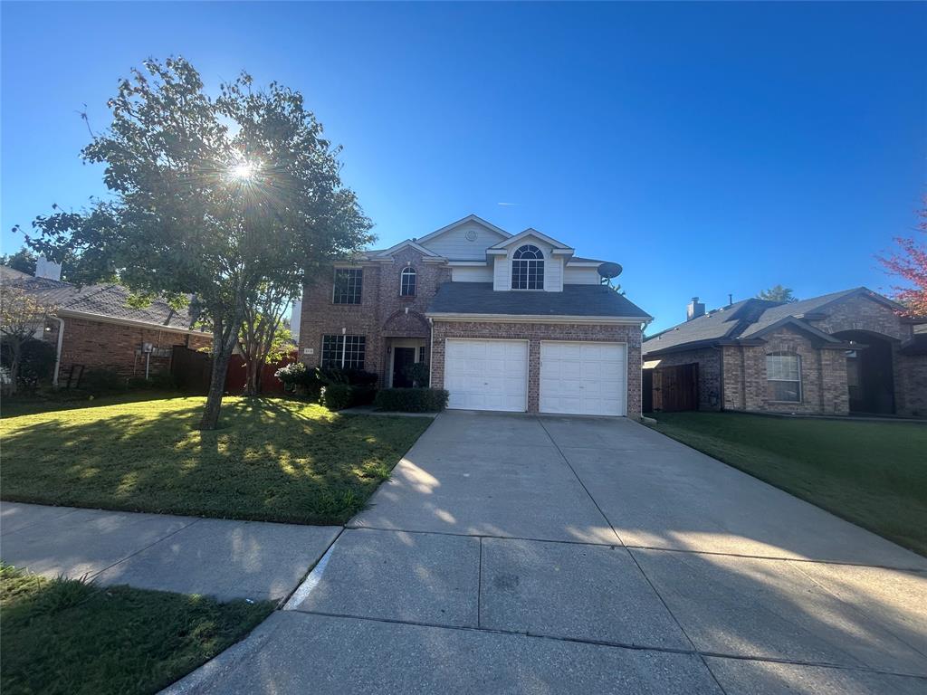 3112 Mason Avenue Corinth, TX 76210 - Photo 1 of 1 a front view of a house with garden