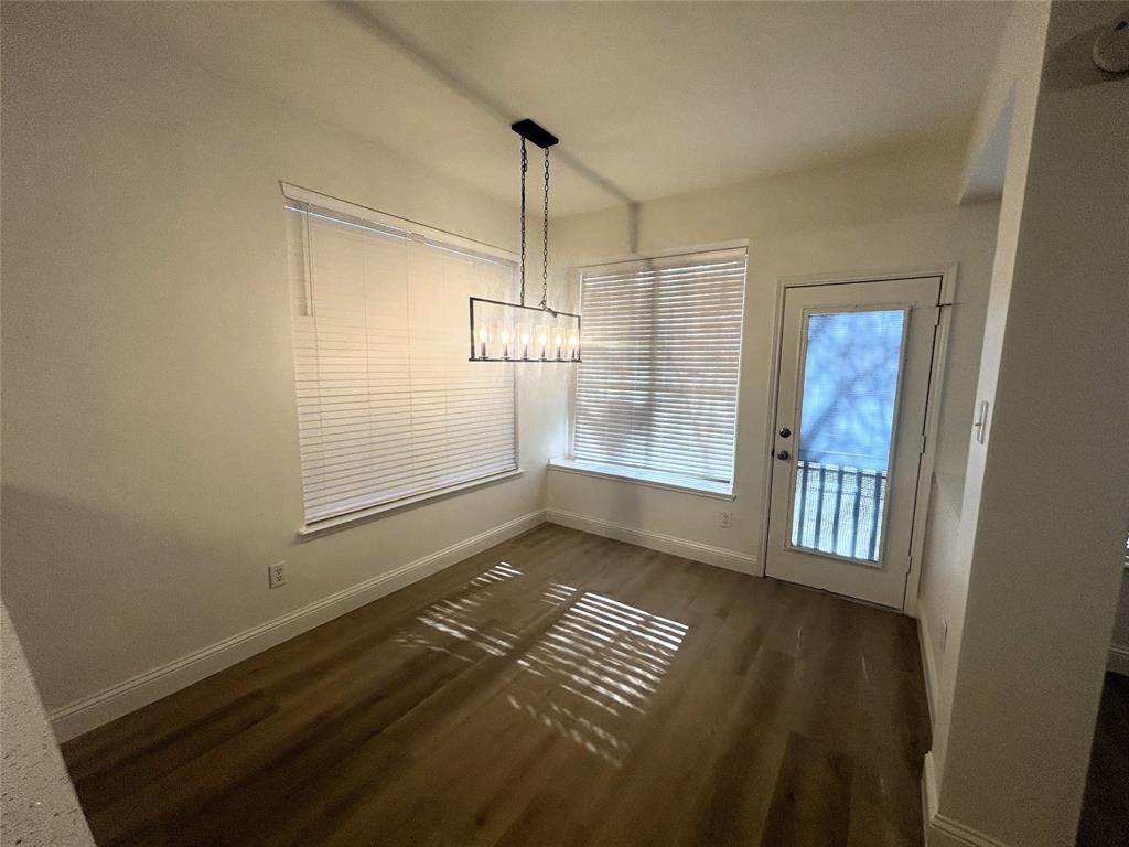 3112 Mason Avenue Corinth, TX 76210 - Photo 7 of 21 a view of empty room with wooden floor and fan