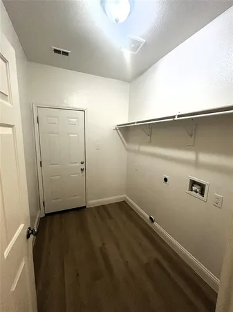 a view of a hallway with staircase