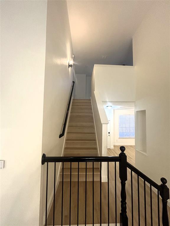 3112 Mason Avenue Corinth, TX 76210 - Photo 10 of 21 a view of a hallway with staircase