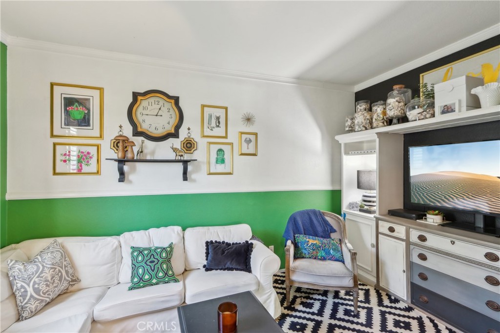 33971 Lily Road Yucaipa, CA 92399 - Photo 11 of 29 a living room with furniture and a flat screen tv