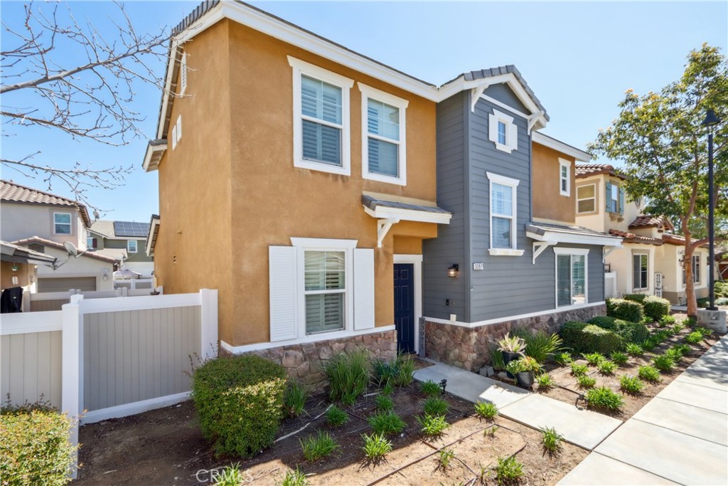 33971 Lily Road Yucaipa, CA 92399 - Photo 24 of 29 a front view of a house with a yard