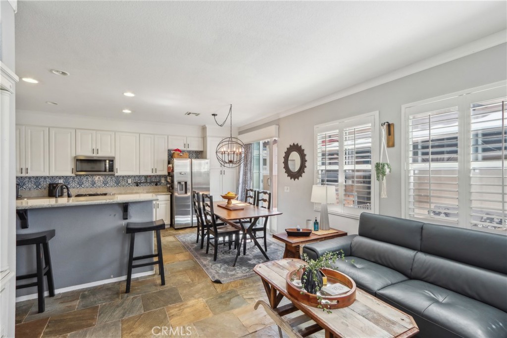 33971 Lily Road Yucaipa, CA 92399 - Photo 3 of 29 a living room with furniture and a large window