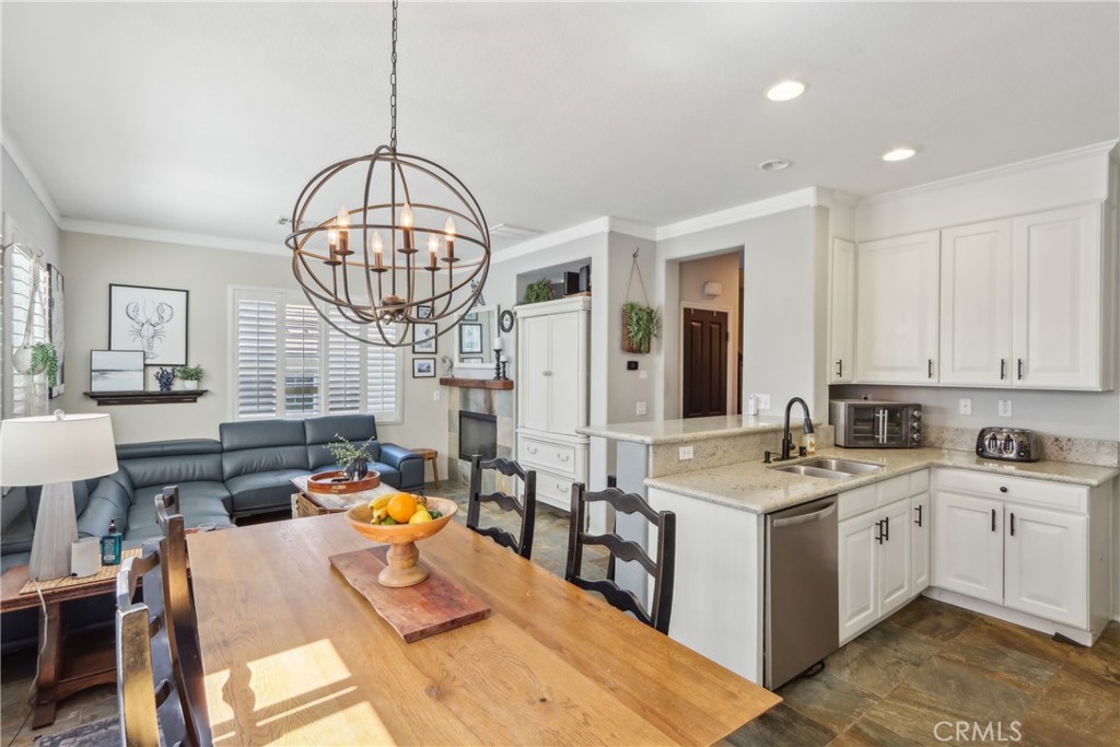 33971 Lily Road Yucaipa, CA 92399 - Photo 4 of 29 a view of a kitchen with a sink and breakfast area