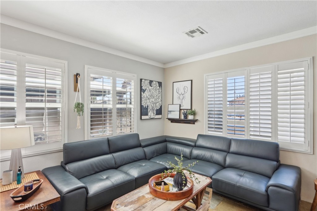 33971 Lily Road Yucaipa, CA 92399 - Photo 7 of 29 a living room with furniture and a large window