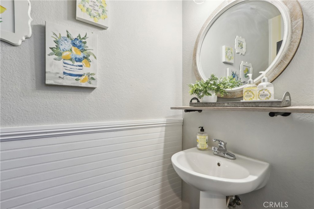 33971 Lily Road Yucaipa, CA 92399 - Photo 8 of 29 a bathroom with a sink and a mirror
