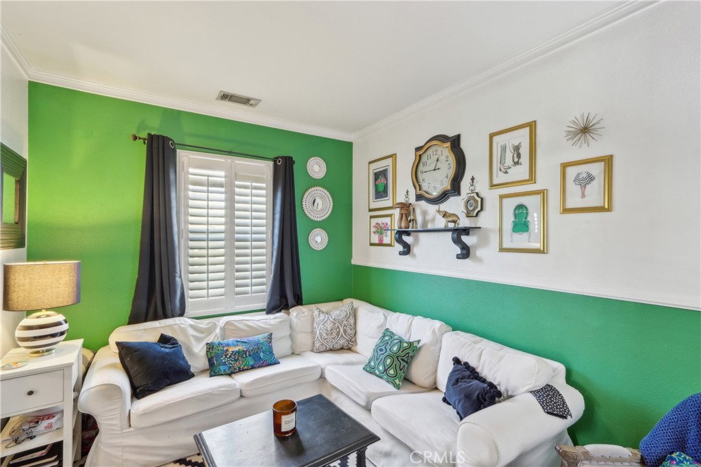 33971 Lily Road Yucaipa, CA 92399 - Photo 10 of 29 a living room with furniture and a window