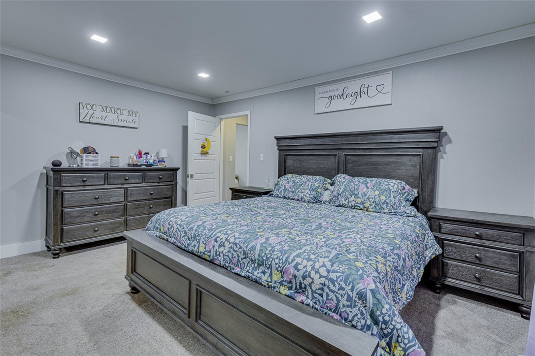 110 Avondale Road Anderson, SC 29624 - Photo 9 of 26 Well-lit sleeping quarters with plush carpeted flooring await.