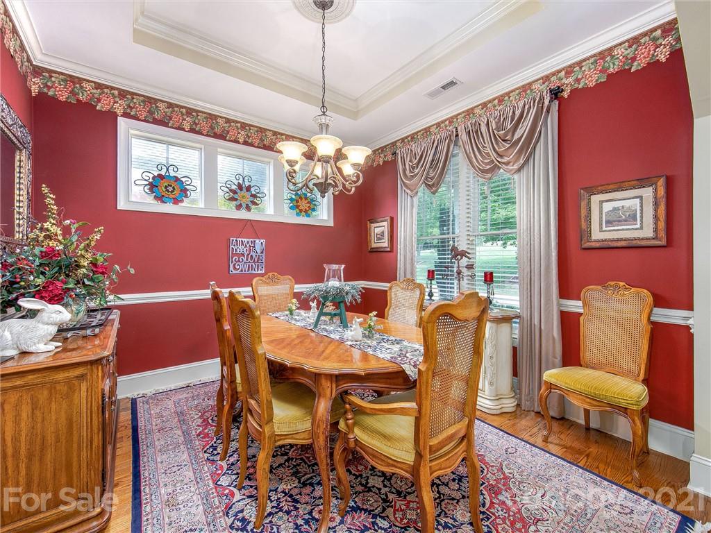 3043 John Watson Road Rutherfordton, NC 28139 - Photo 11 of 48 a dining room with furniture a livingroom and chandelier